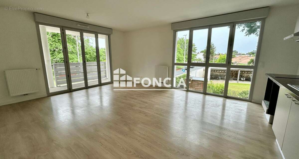 Appartement T3 de 68 m² avec terrasse parking et cellier - photo 2