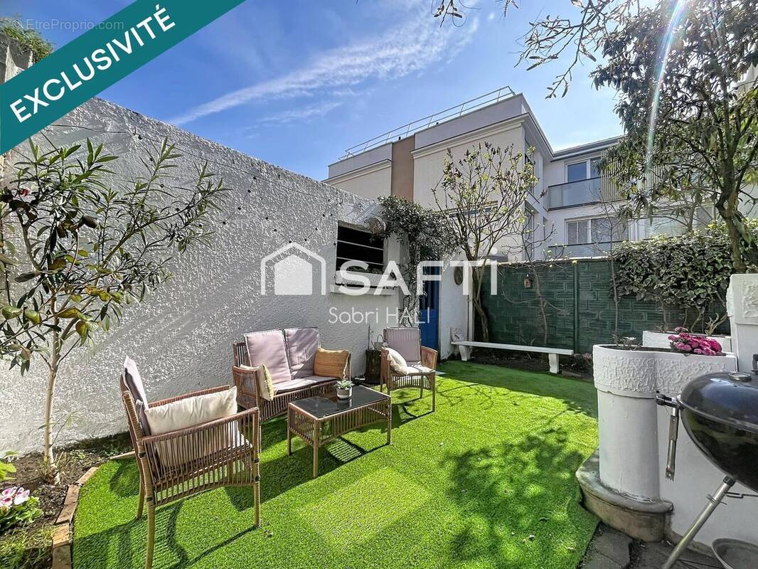 Photo 1 - Maison à COURBEVOIE