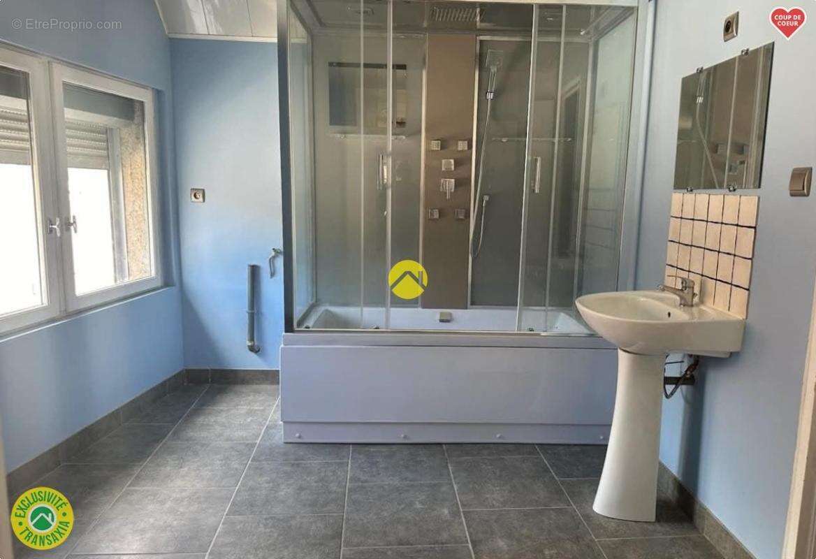 Logement rénové sans terrain - photo 6