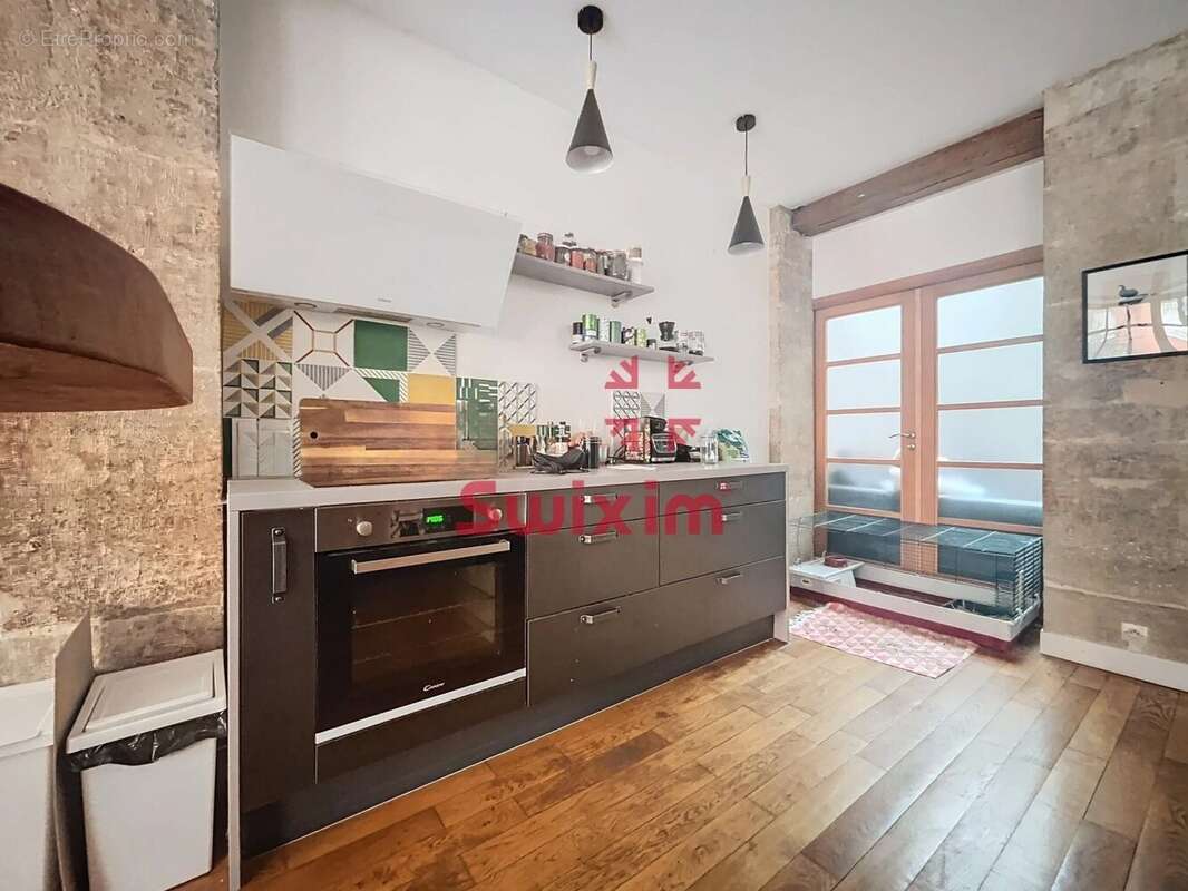 3472849_896983_photo_4.jpg - Appartement à PARIS-11E