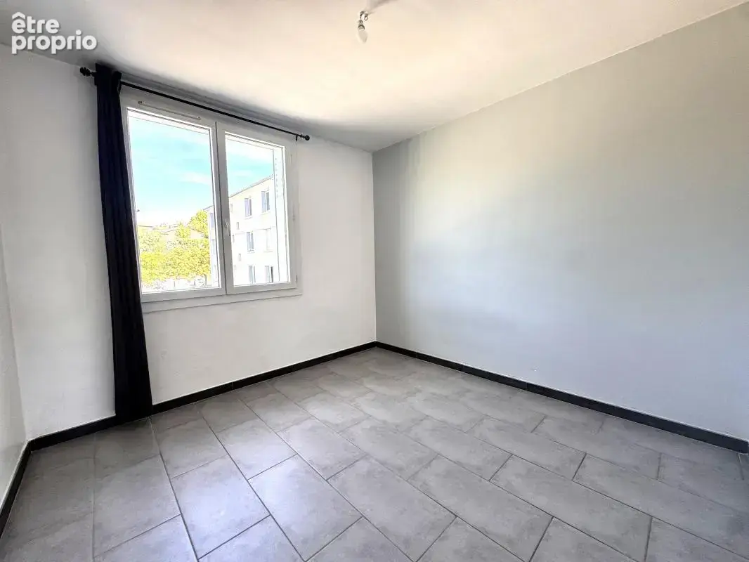 Appartement T3 avec Terrasse et cave - photo 2