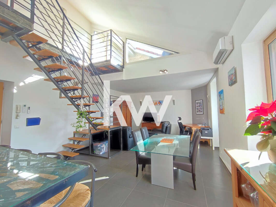 Appartement 91 m² à Roche-La-Moliere  - photo 2