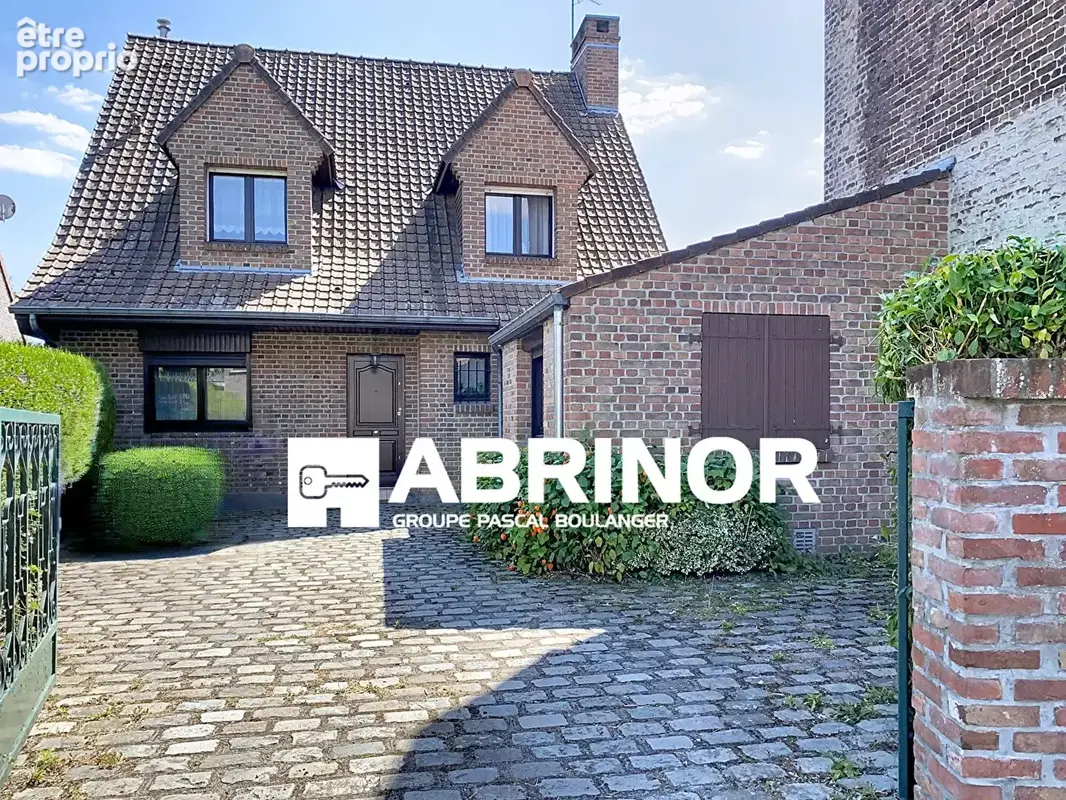 Maison individuelle - 3 chambres + bureau-mezzanine-cave-jardin-garage. - photo 1