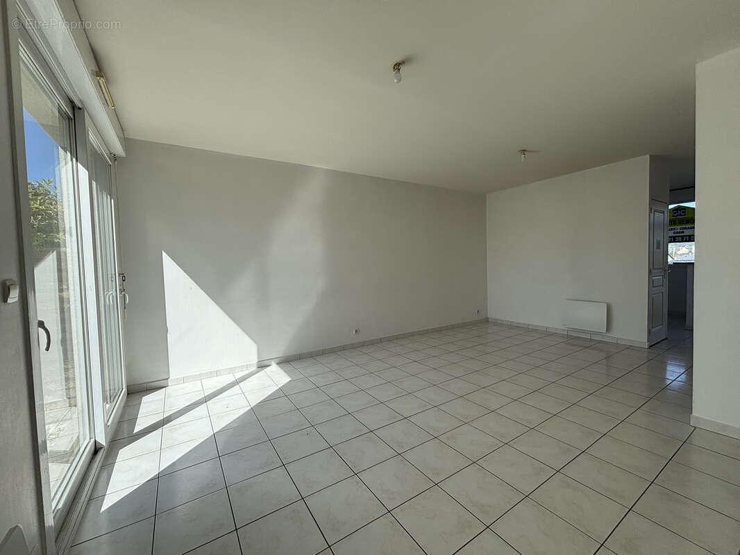 Maison en triplex avec jardin, garage et stationnement - photo 4