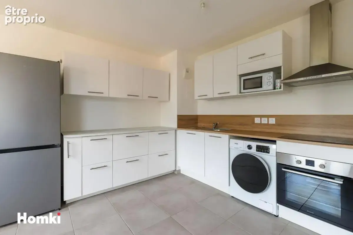 Appartement T3 de 65 m² avec terrasse et place de parking à Vénissieux 69200, Boulevard Laurent Gérin - photo 4