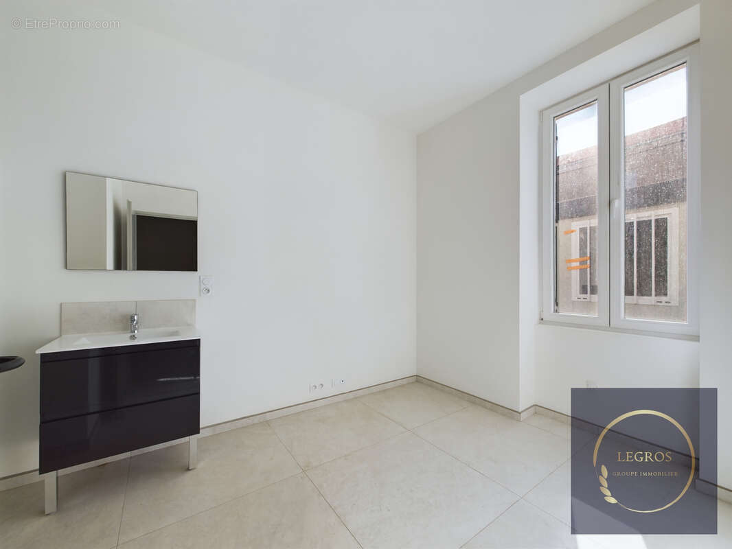 Appartement de type 2 en rez de chaussé - photo 2