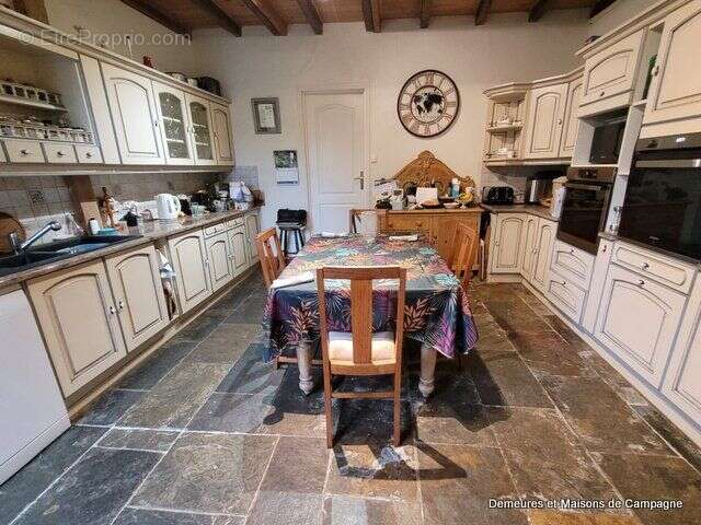 Maison 124 m² à Juvigny-Le-Tertre  - photo 4