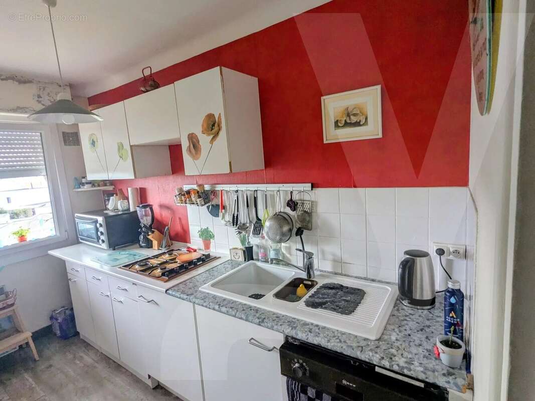 T2 de 48 m² avec balcon, parking couvert et caves – Rue Hector Berlioz - photo 3
