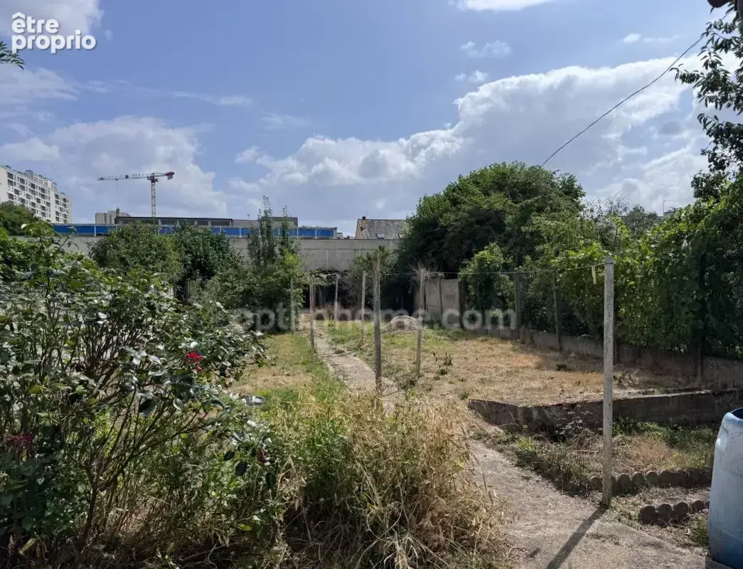 Terrain constructible en ville quartier Bréquigny, grande parcelle orientée Sud - photo 5