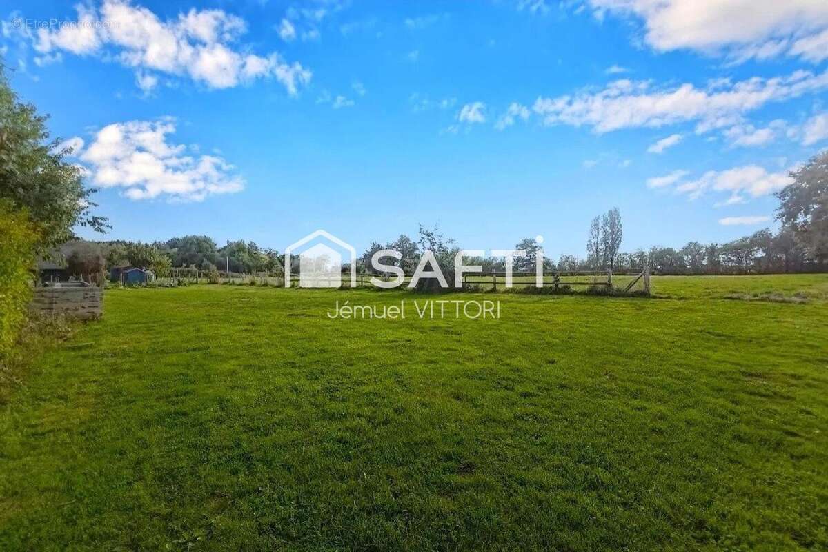 Photo 3 - Maison à LE BOURGNEUF-LA-FORET