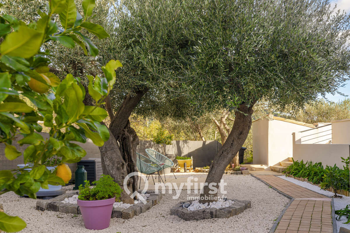 Un appartement entre jardin secret et rooftop suspendu - photo 3