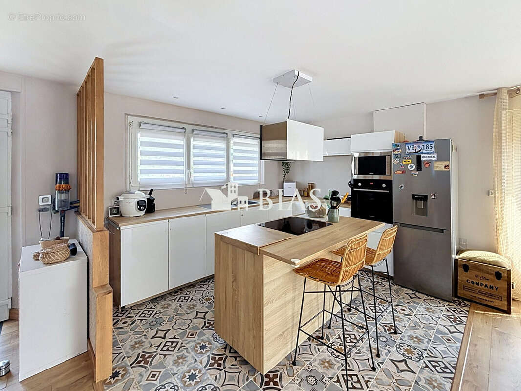 Maison 65 m² à Poses  - photo 4