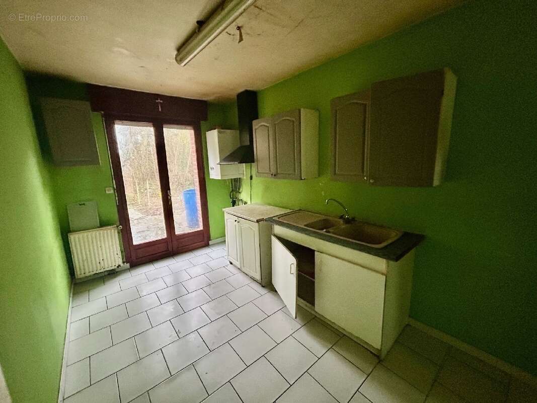 Maison à BRUAY-LA-BUISSIERE