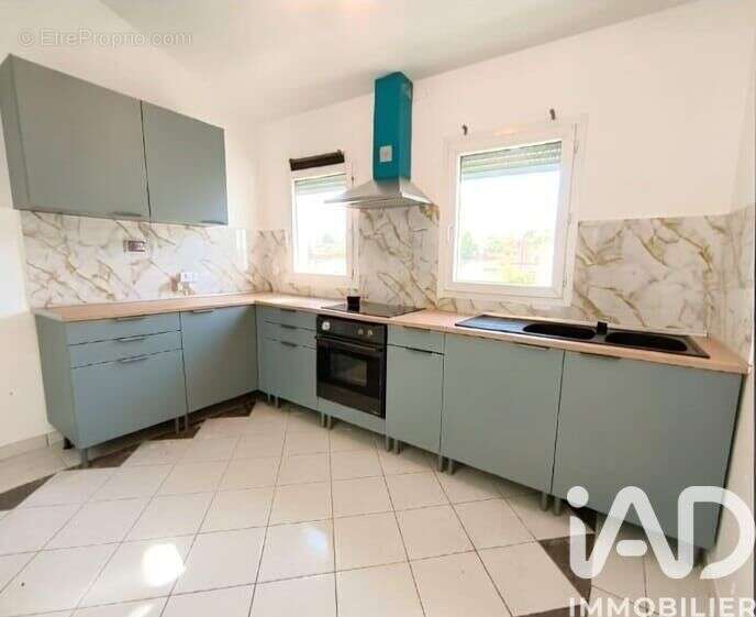 Photo 2 - Maison à ANDREZIEUX-BOUTHEON