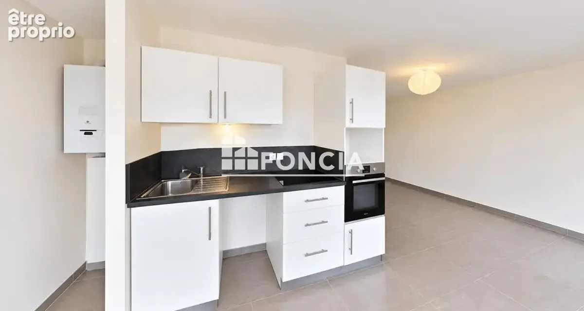 MARCY-L’ÉTOILE – T2 45,25 m² avec balcon et garage box fermé - photo 3