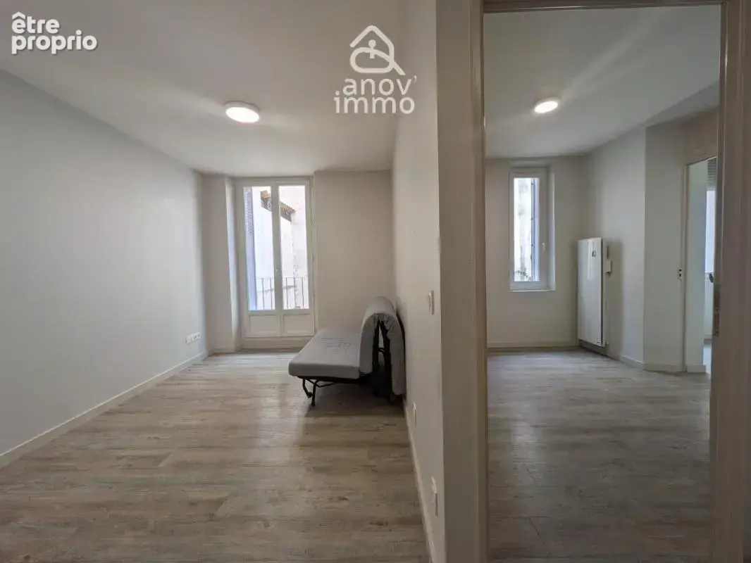 Appartement rénové 70m2 traversant avec  balcon, situé Rue d - photo 4