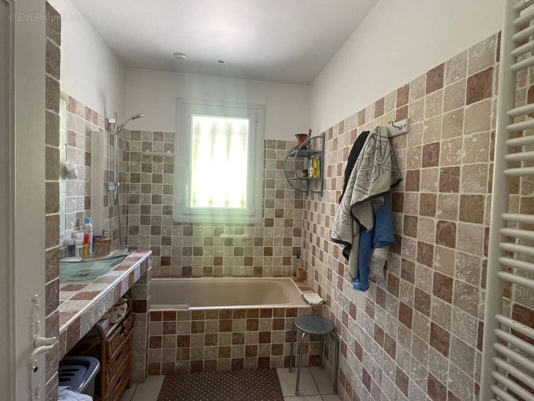 Exclusivité - villa avec 115,78 m² habitables et 165,04 m² de terrasses - photo 9