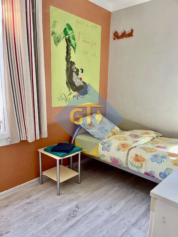 Maison à LAUDUN-L'ARDOISE