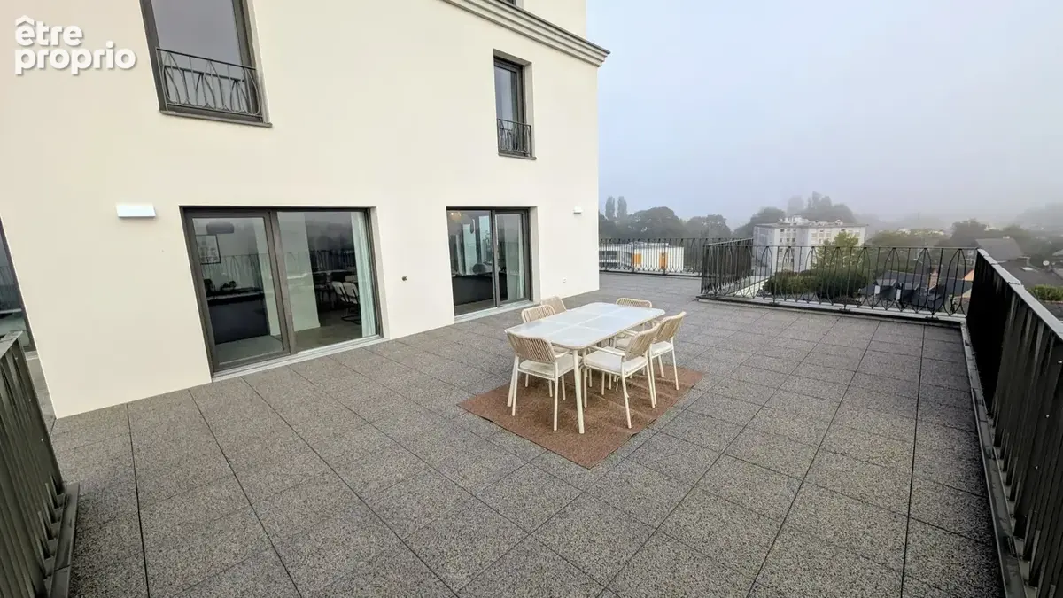 Appartement 113m2 - Terrasse exceptionnelle de 103m2 dominant Rennes Saint-Hélier - photo 7