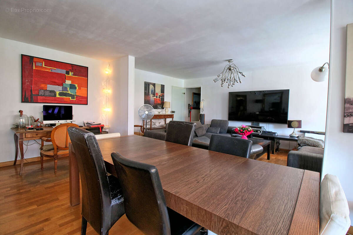 A vendre - bel appartement 4 pieces - garage - balcon - photo 2