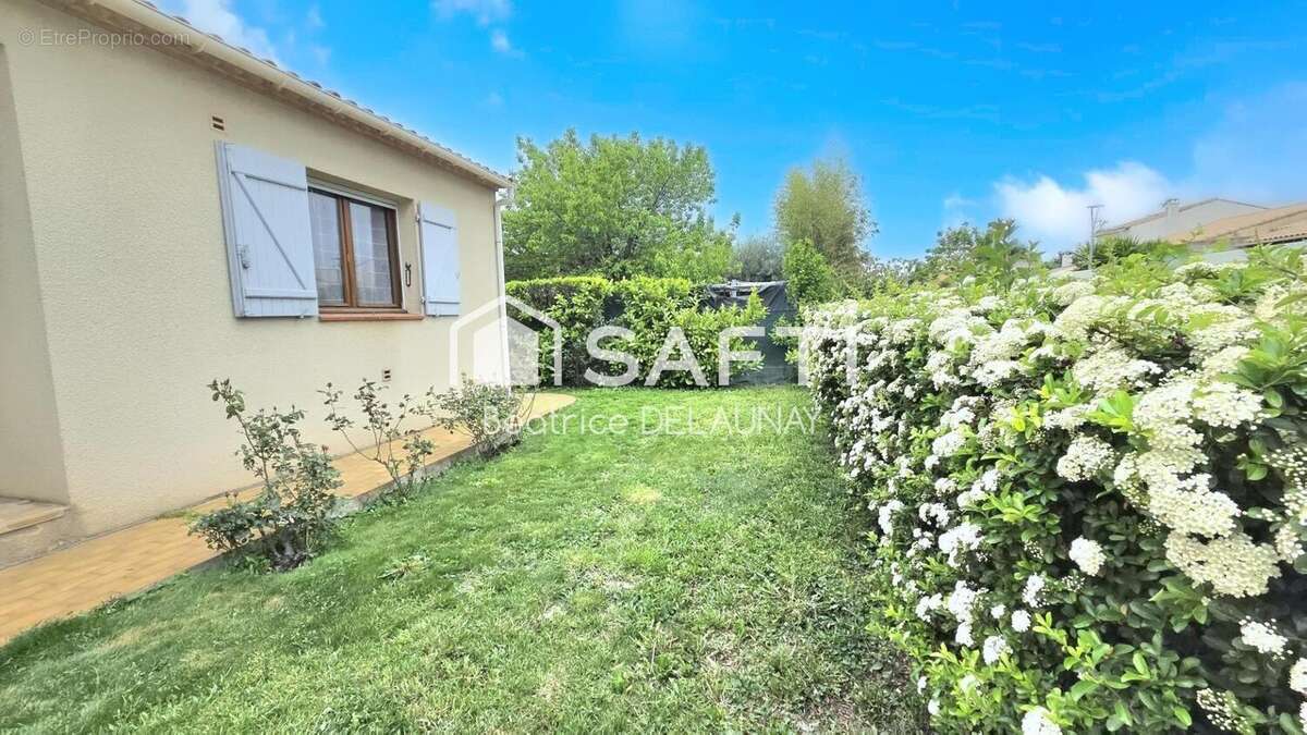 Photo 2 - Maison à SAINT-LAURENT-D'AIGOUZE