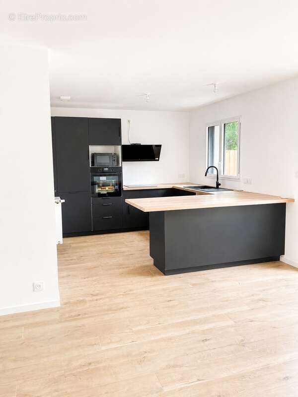 Maison de plain-pied de 102 m² LANNILIS (29) - photo 4