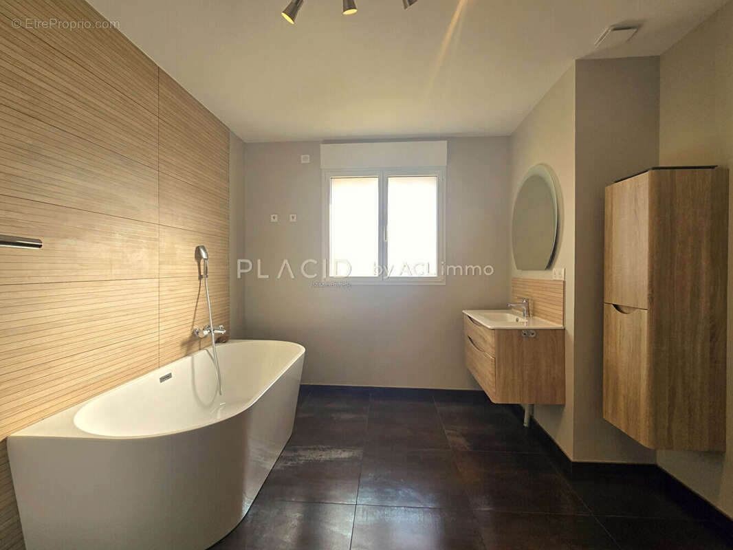 Maison de 6 pièces 200 m2 - photo 10