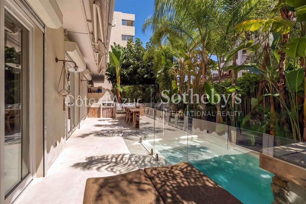 Appartement de prestige à Cannes Palm Beach avec terrasse paysagée, piscine privée et garage - photo 20