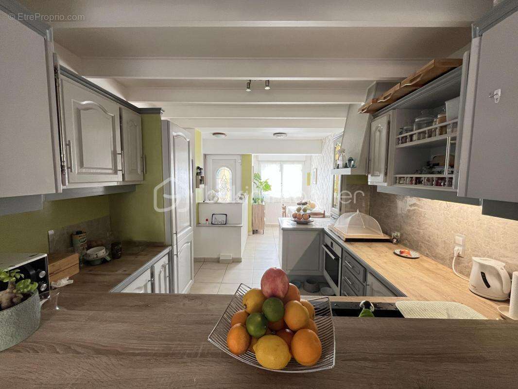 Maison familiale 108 m² – 3 chambres + bureau – Jardin – 2 garages - photo 5