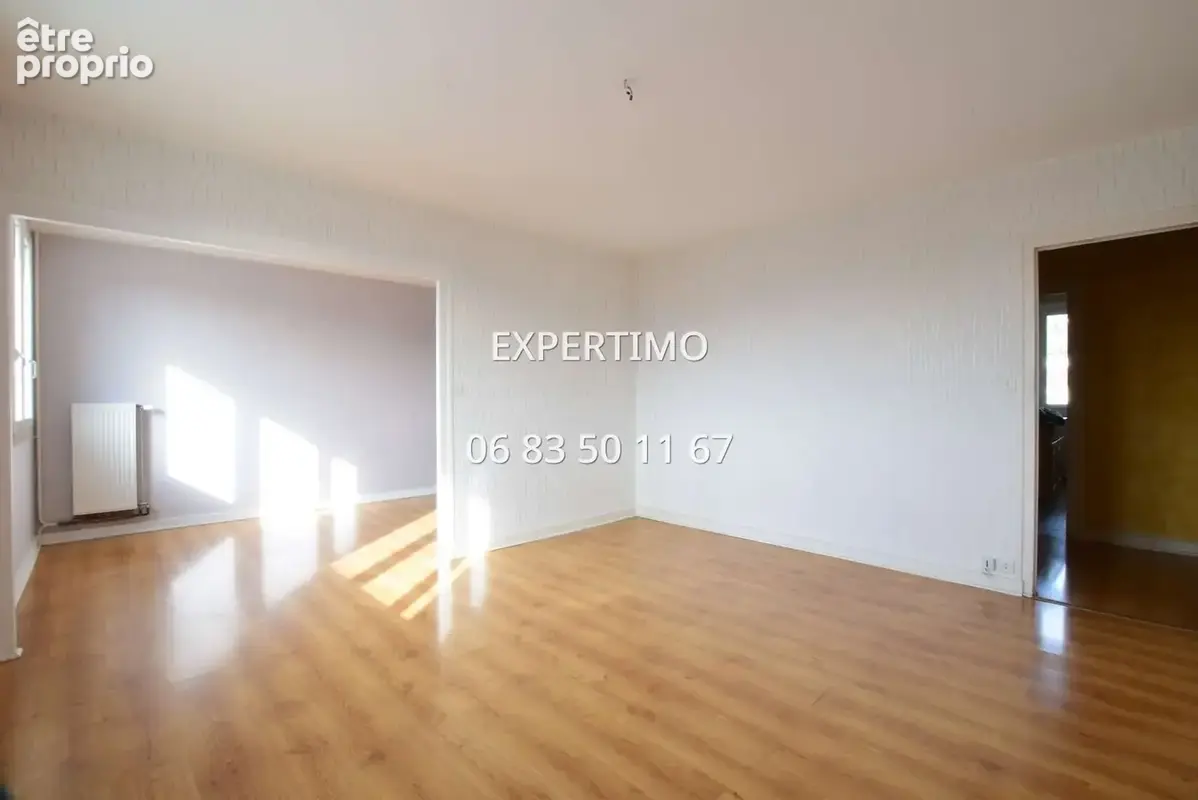 Appartement lumineux - 3 chambres poss. 4 - fort potentiel - photo 2