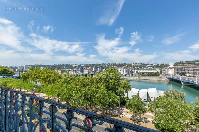 Lyon 7ᵉ – Duplex haussmannien d'exception sur les quais du Rhône – Vue panoramique sur Fourvière - photo 14