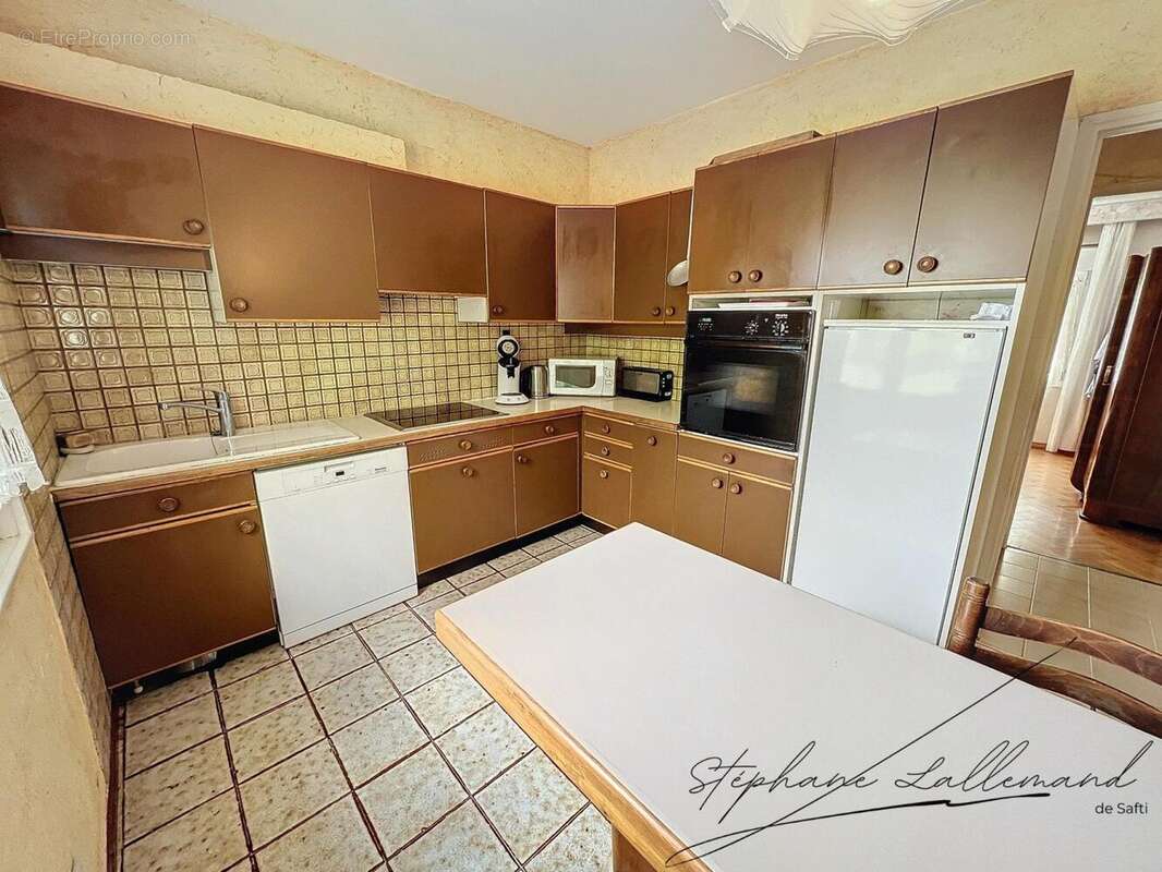 Photo 6 - Maison à SAINT-JULIEN-LES-ROSIERS