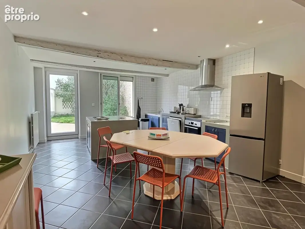Villeneuve-sur-Lot, à deux pas du centre-ville, magnifique maison en pierre de 193 m² sur un terrain d'environ 180 m². Énorme co - photo 6