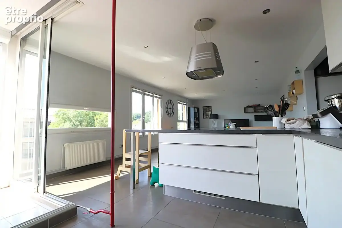 Appartement T4 de 90 m² avec terrasse + garage + cave - photo 5
