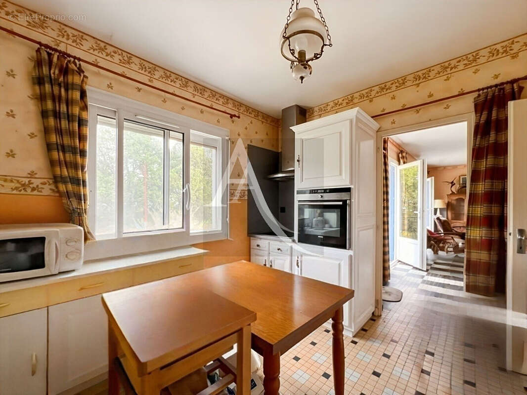 Découvrez cette charmante maison nichée dans un magnifique village en hauteur - photo 5