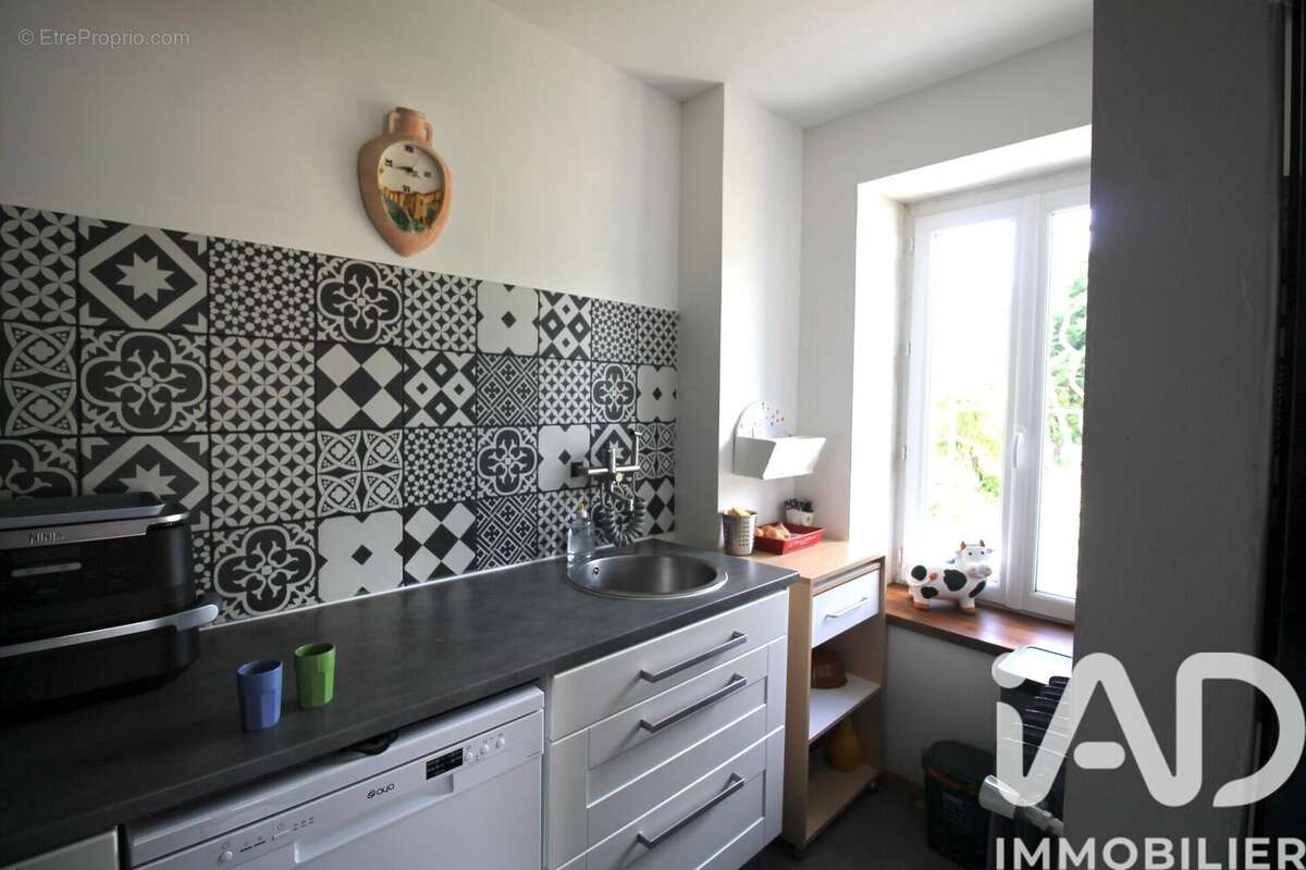Maison 100 m² à Villefranche-De-Panat  - photo 7