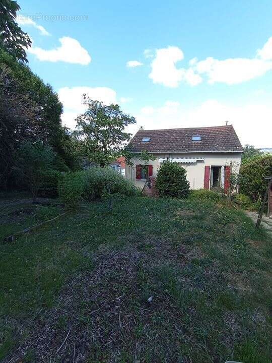 Maison 4 chambres grand sous-sol - photo 2