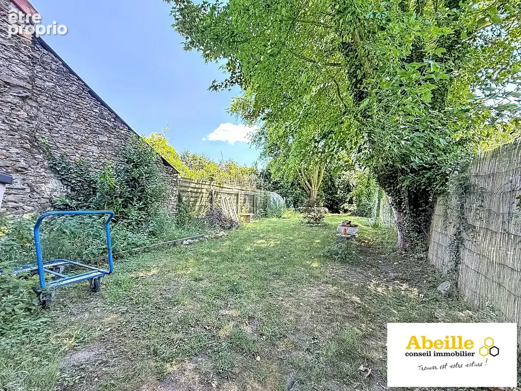 Immeuble de deux appartments en centre villle avec terrain et grange - photo 17