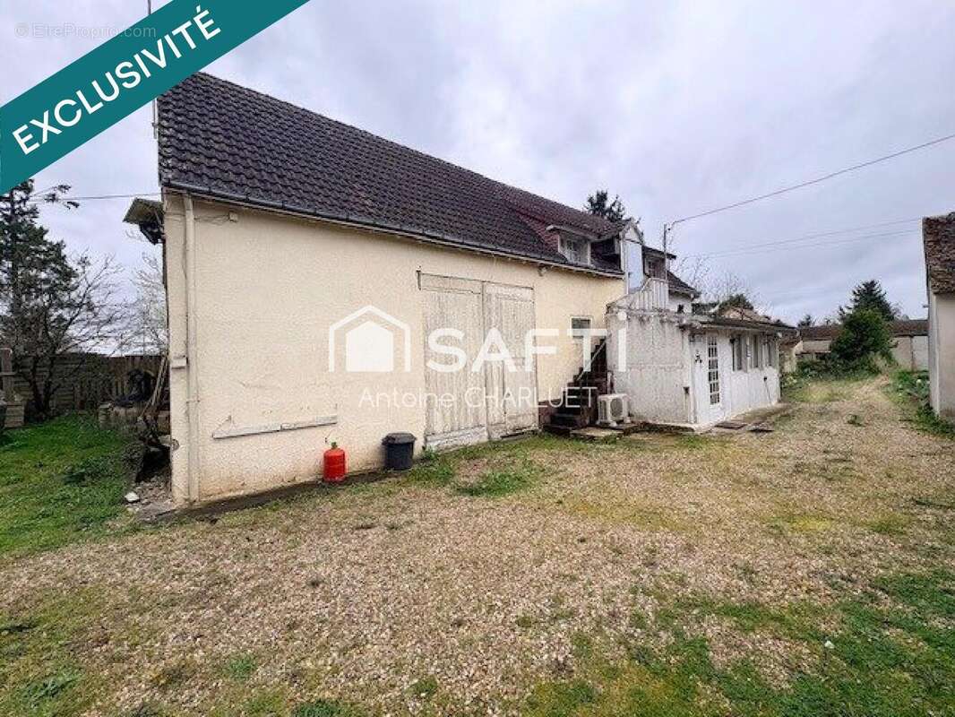 Photo 2 - Maison à SAINT-GENOU