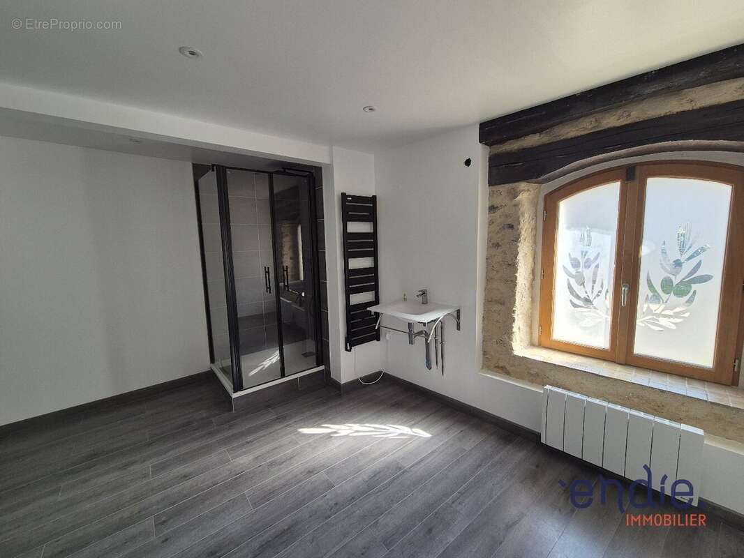 Maison de 91m 2 en pierres avec poutres apparentes - photo 10