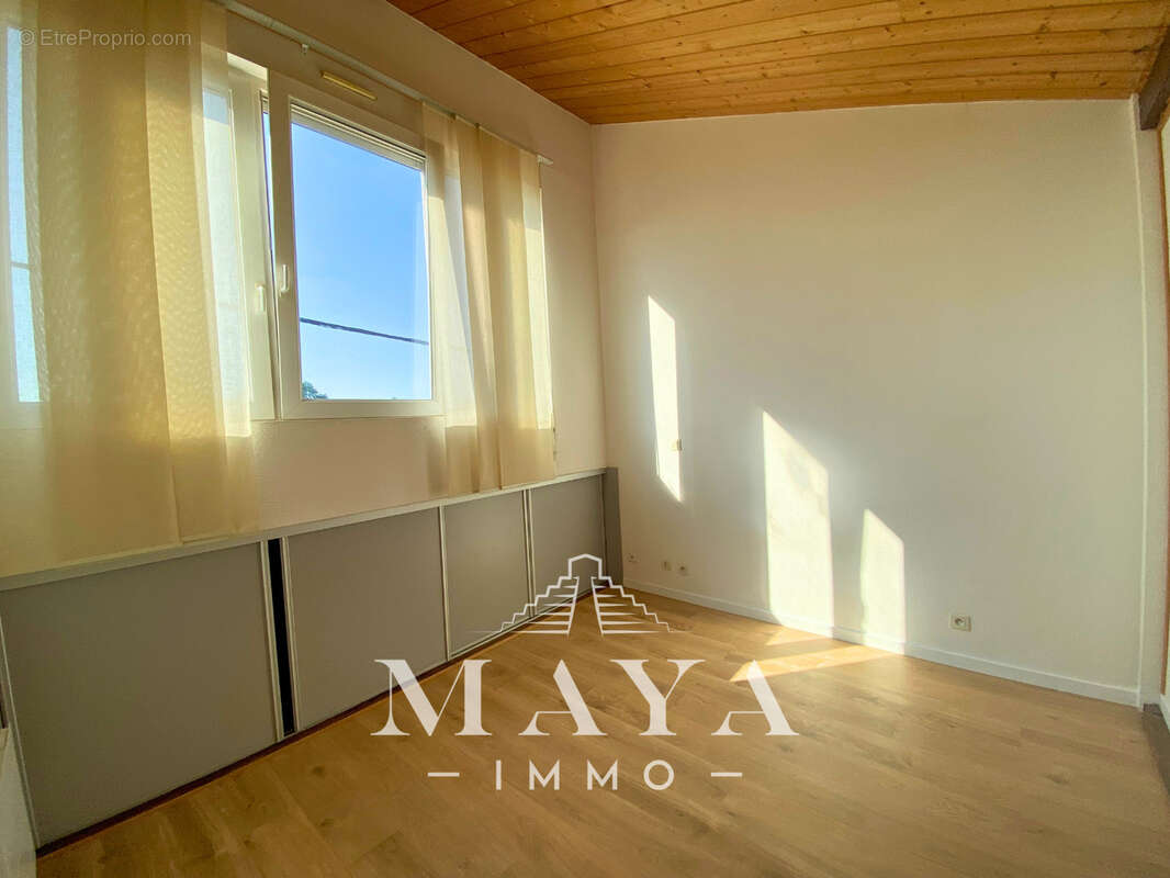Appartement F3 en Duplex avec parking - photo 10