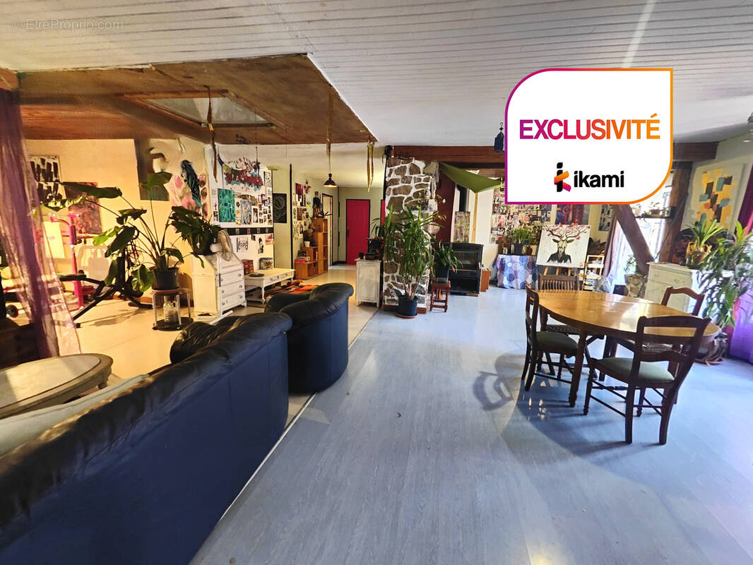 Ensemble immobilier avec terrain de 1 000 m2 et stationnement - photo 1