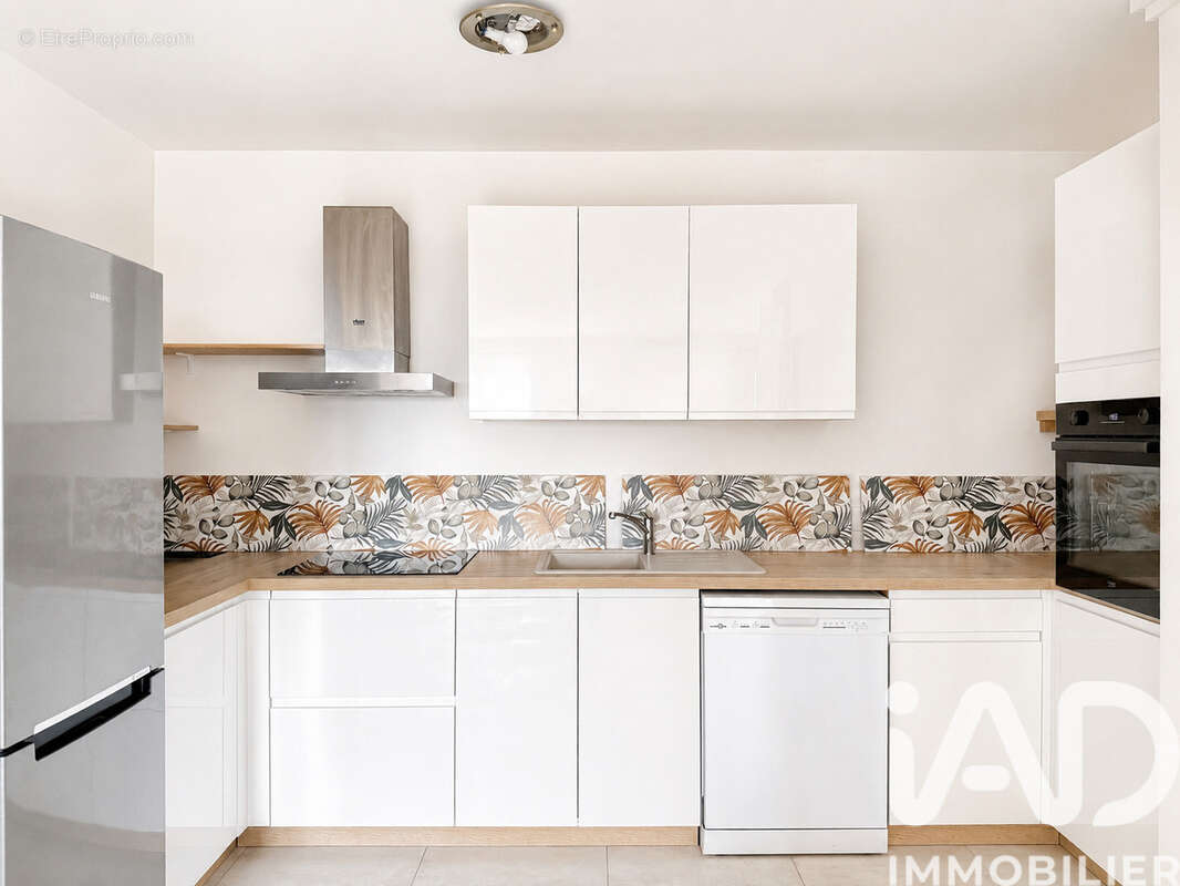 Photo 3 - Appartement à SAINT-GENIS-LAVAL