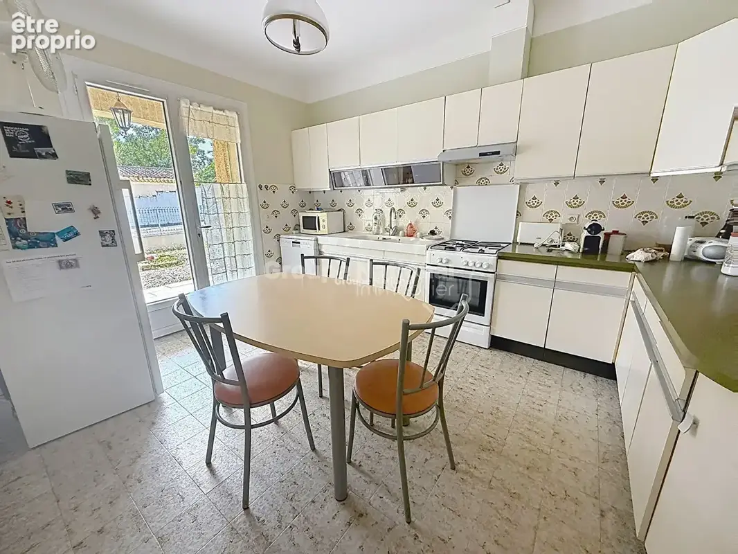 Maison familiale de plain-pied avec garage sur terrain de 802 m² - photo 7