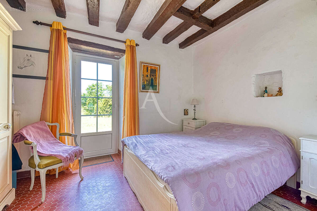 Maison de caractère à vendre à La Possonnière, implantée sur un magnifique terrain d'un hectare. - photo 7