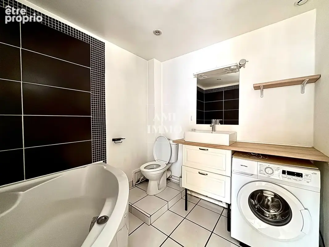 Appartement F2 - centre bourg - photo 6
