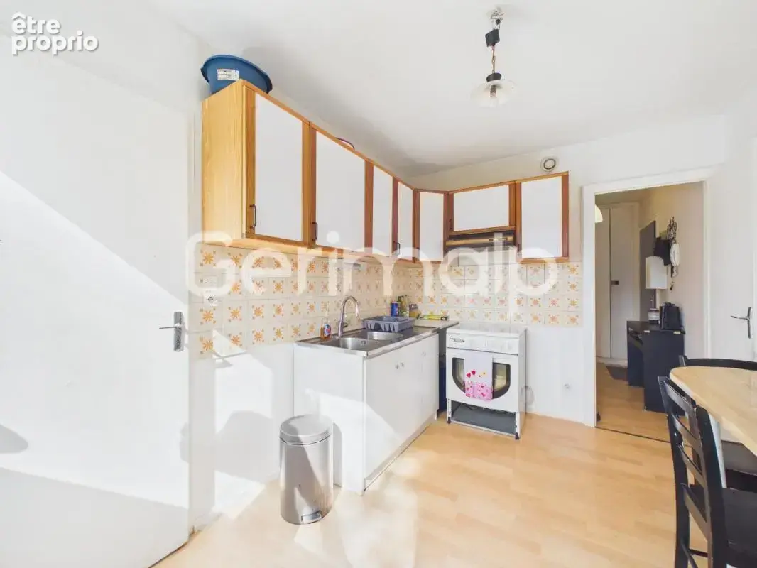 Vente - Appartement - 2 pièces + cuisine - 50,47 m² - 230 000 € - photo 4