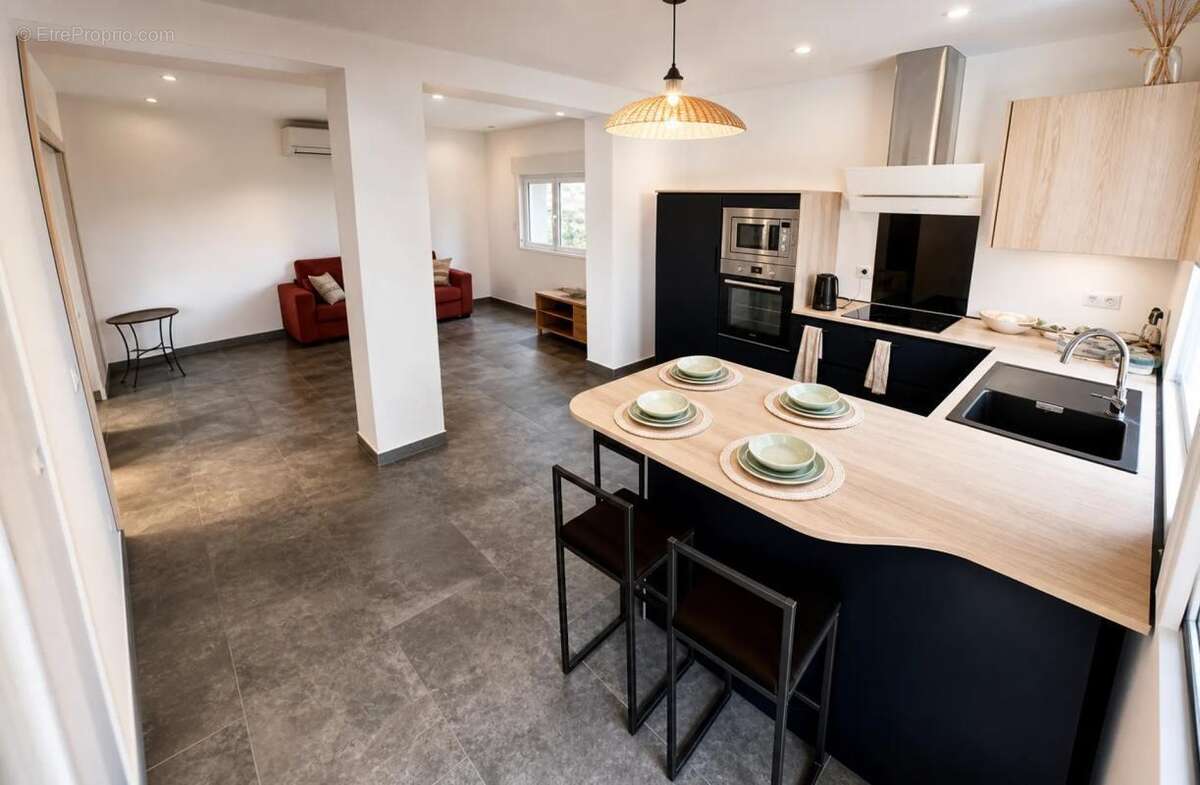 Maison de 10 pièces de 200 m² à Bourges - photo 3