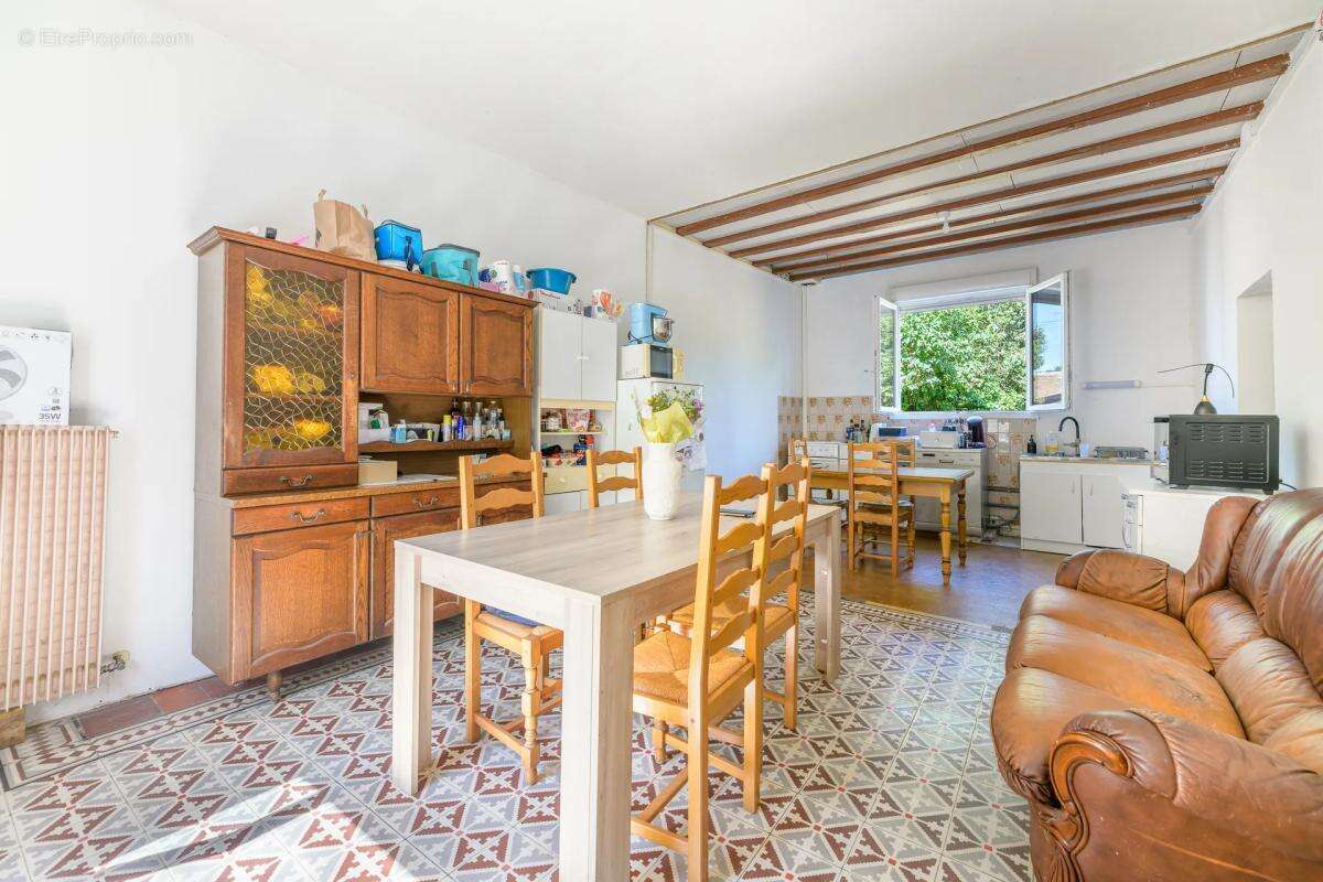 Maison de 5 pièces de 102 m² à Villechauve - photo 5