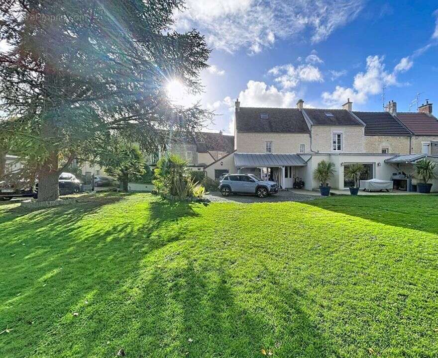Maison à LOUVIGNY